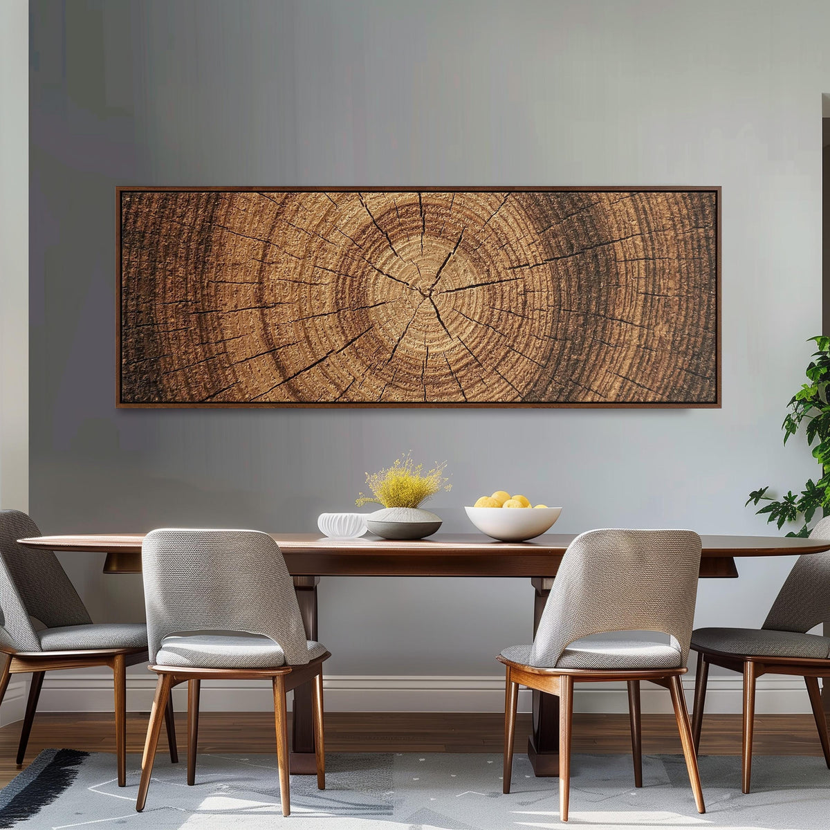 Warm oak wood ring long horizontal canvas print above a dining table