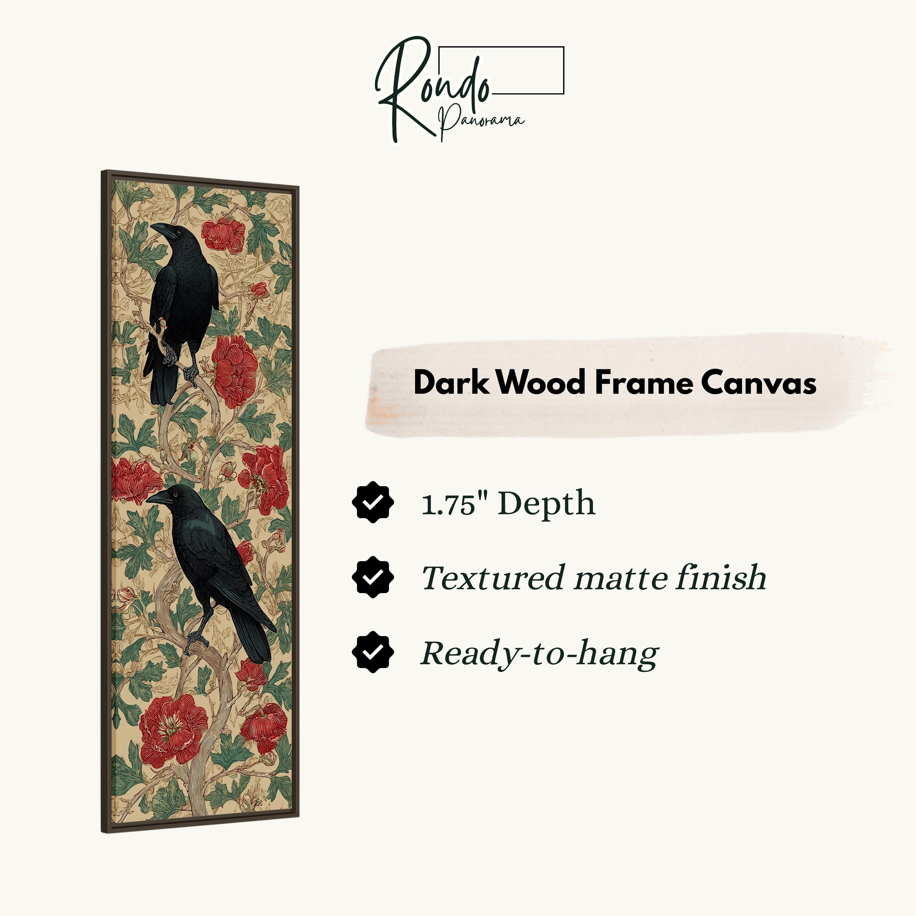 The image is a framed artwork depicting two black birds perched on a branch with red flowers. The artwork is described as a "Dark Wood Frame Canvas" with a 1.75" depth, a textured matte finish, and a ready-to-hang feature.