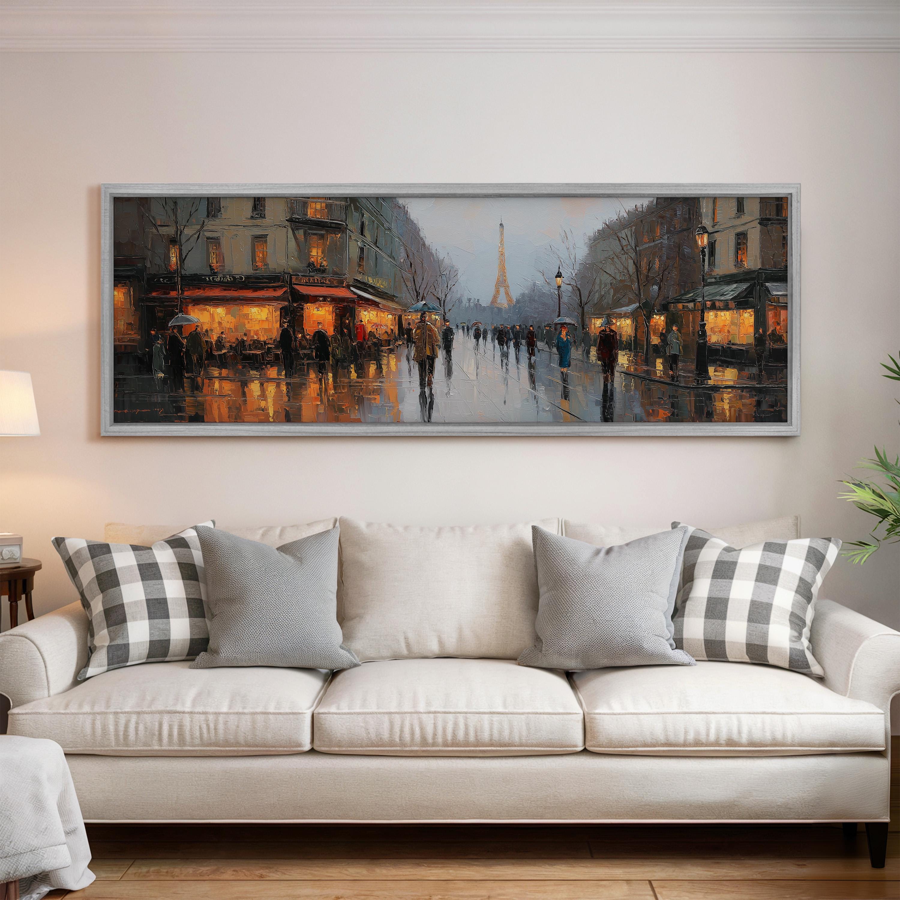 a large painting of a city street scene with people walking on the sidewalk, illuminated by the warm glow of streetlights and building lights.