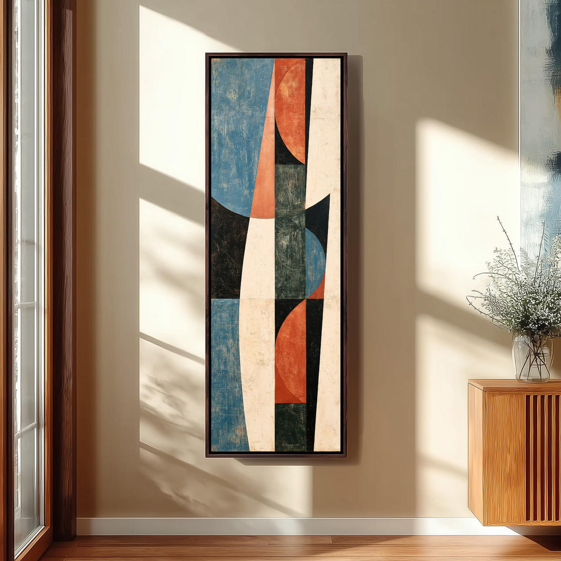 Textured curves in blue, orange and black long vertical canvas print in a sunlit living space