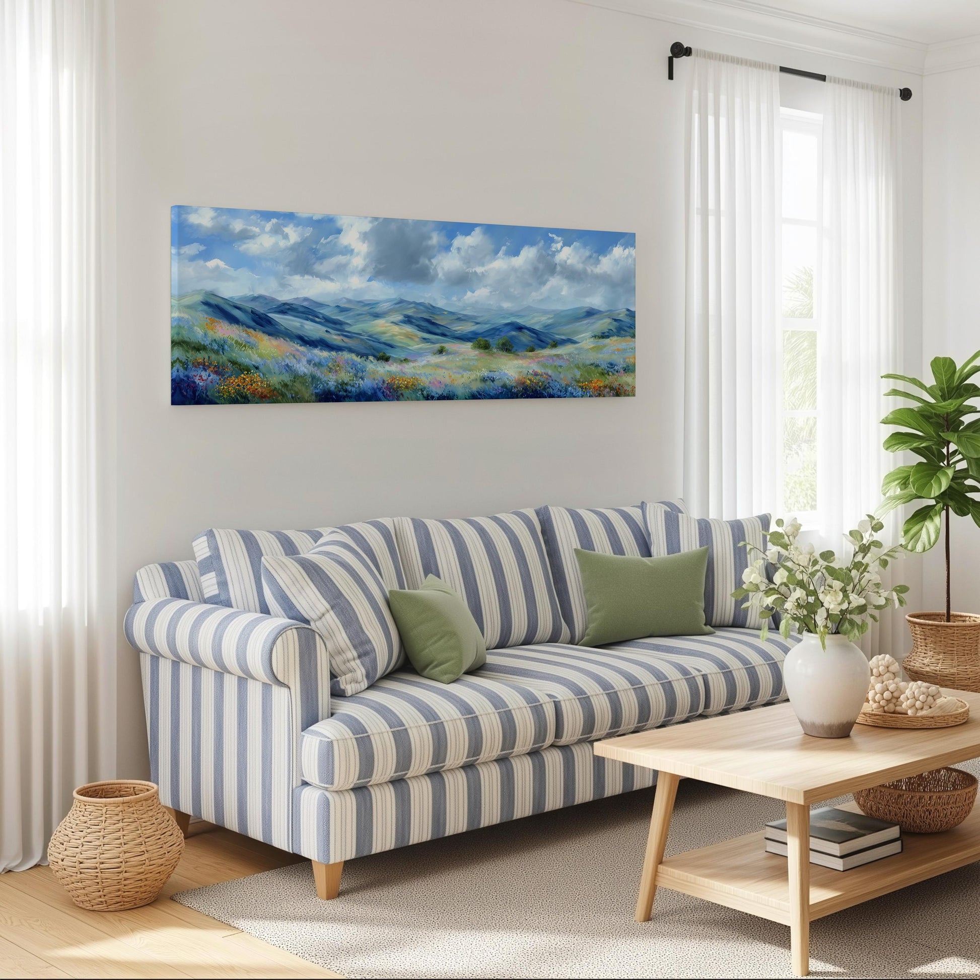 a cozy living room with a striped sofa, a wooden coffee table, and a large landscape painting hanging on the wall.