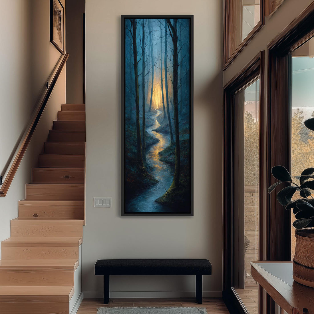 a serene indoor setting with a wooden staircase leading up to a large window, which offers a view of a forest. A large painting of a winding path through the trees is hanging on the wall, adding a touch of nature to the space. A black bench is positioned in front of the painting, inviting visitors to sit and enjoy the view.