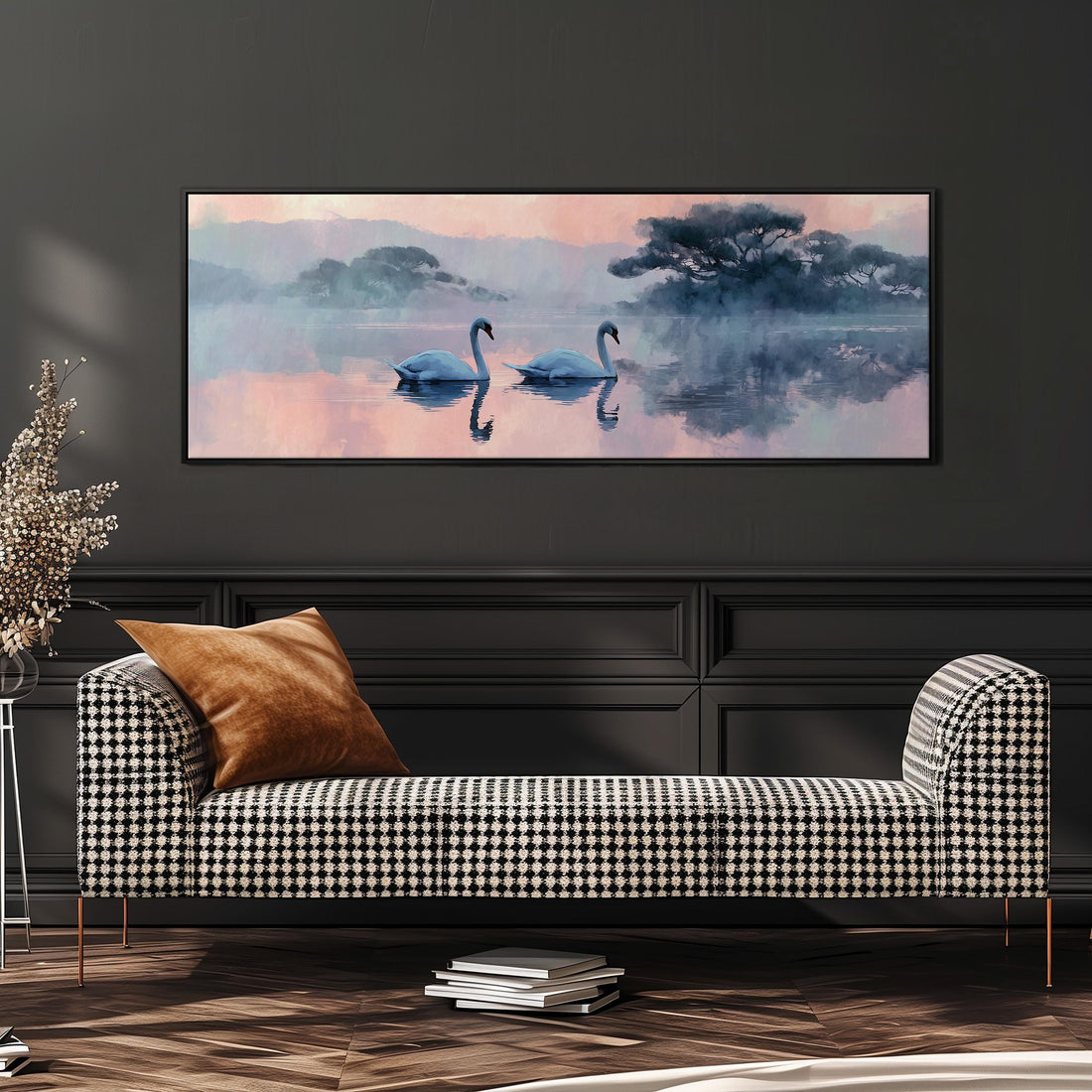 a large painting of two swans floating on a serene lake, with a warm, orange-colored sofa in the foreground.