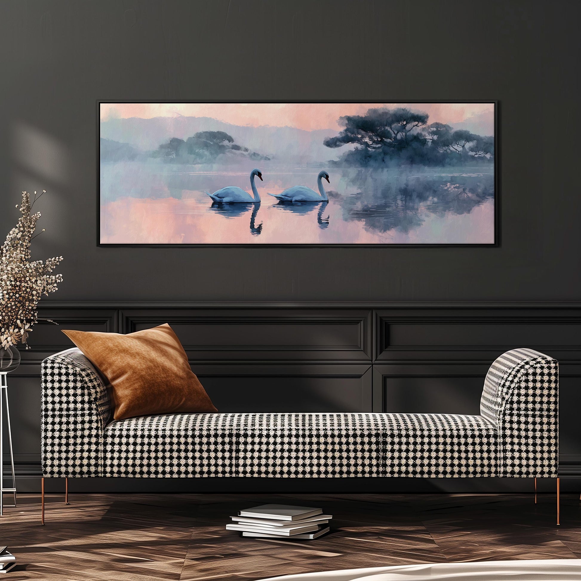 a large painting of two swans swimming in a lake, with a black and white checkered sofa in the foreground.