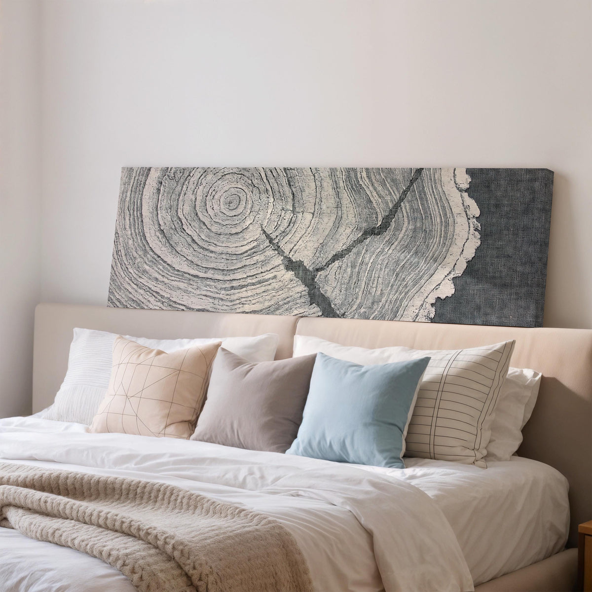 Grey tree ring on linen texture wide panoramic canvas print above a bed in a bedroom