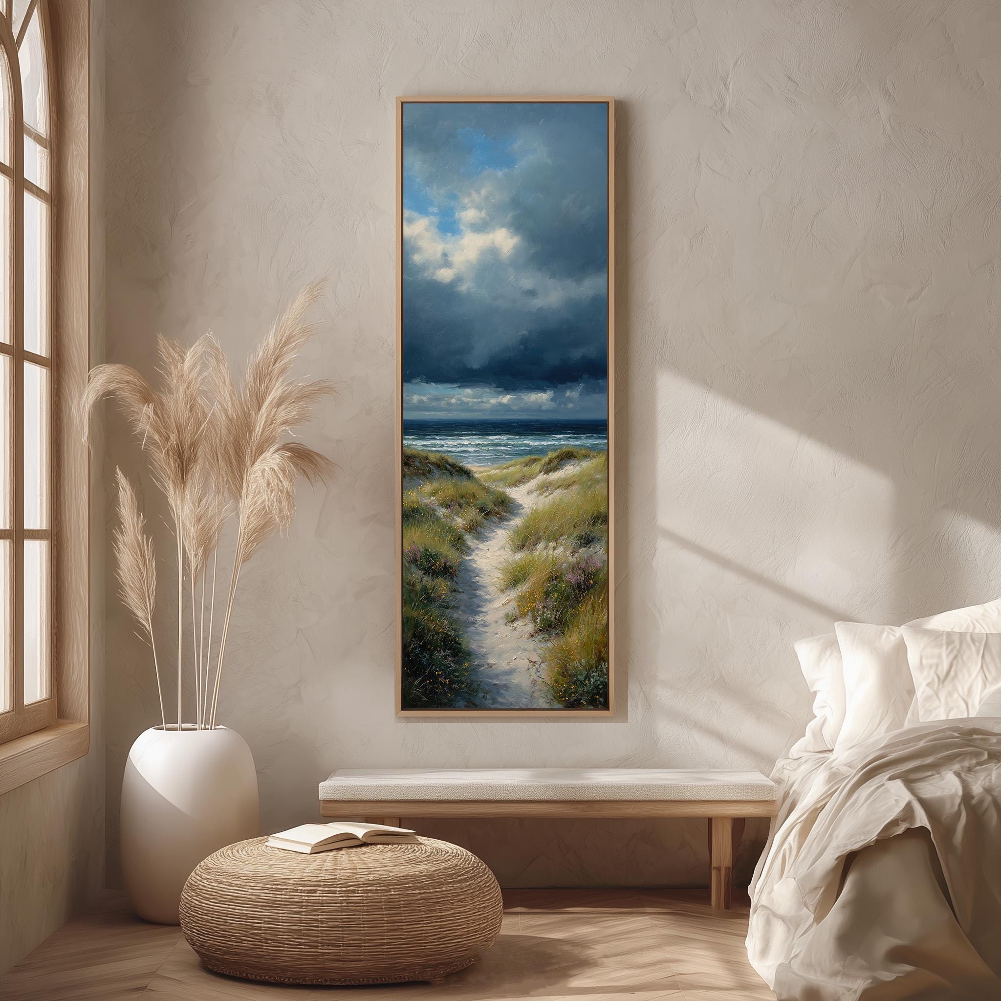 a serene bedroom scene with a large painting of a beach landscape hanging on the wall, a white bed with a white pillow, a white vase with tall potted plants, and a wooden bench.