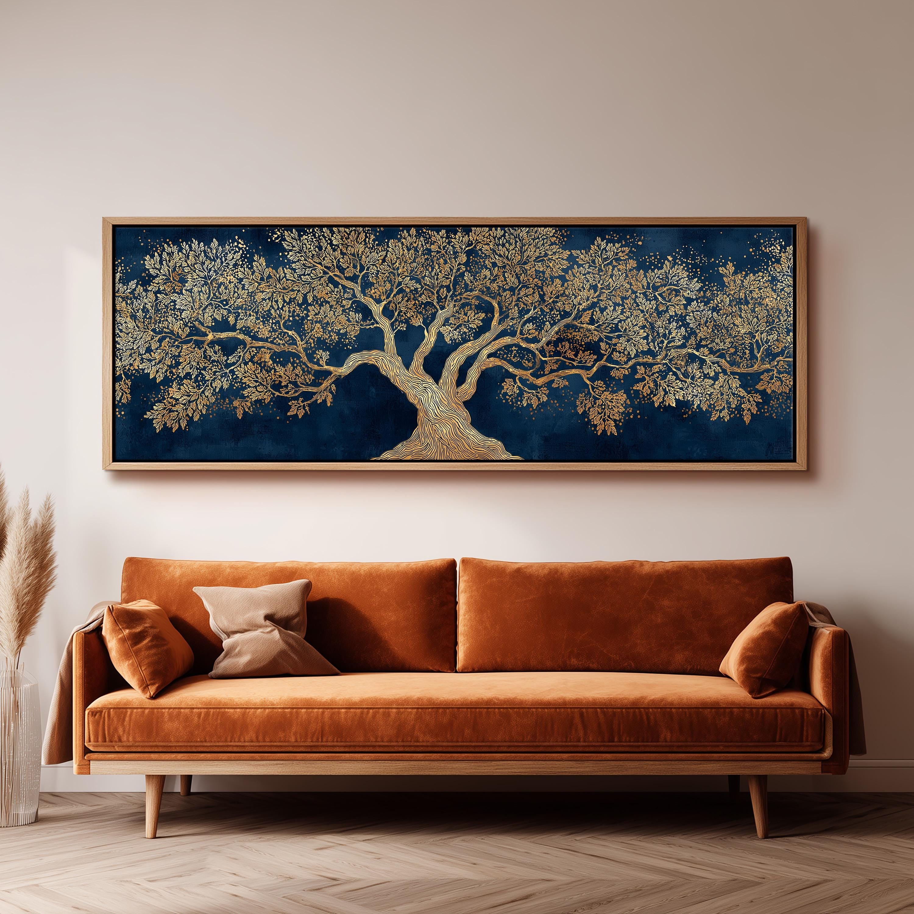 a large, ornate tree painting hanging on a wall above a brown sofa.