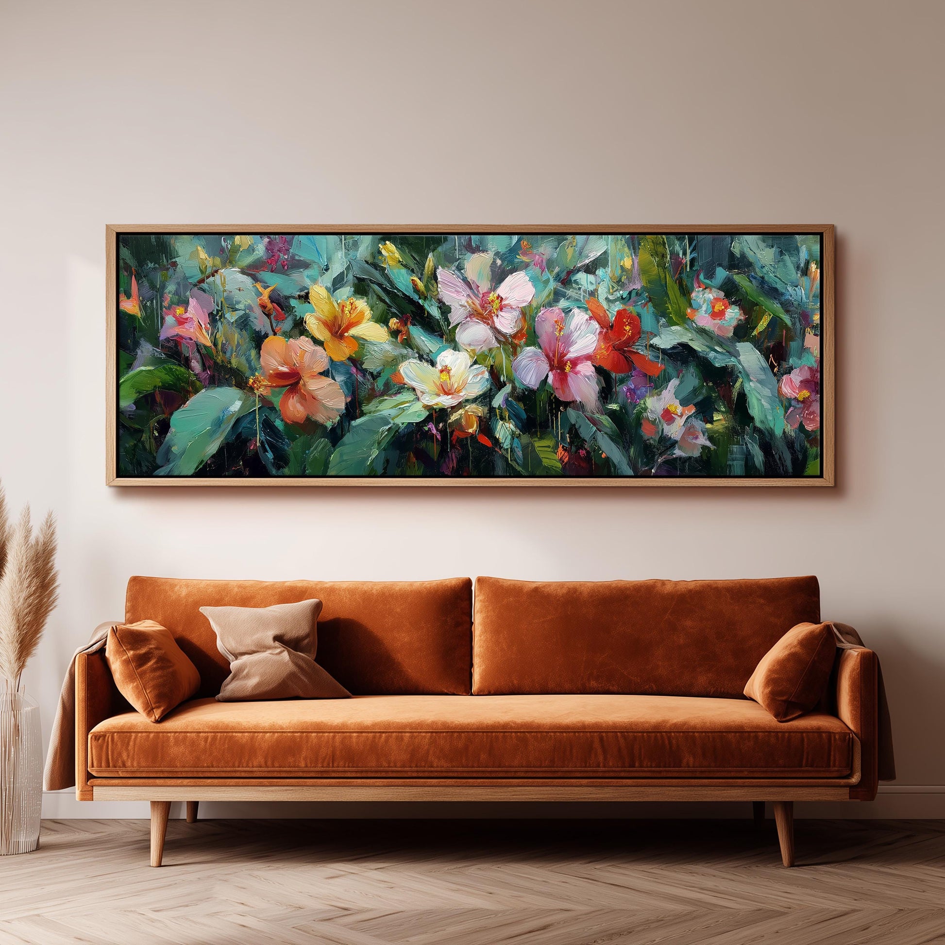 a large, vibrant painting of flowers hanging on a wall above a brown sofa.