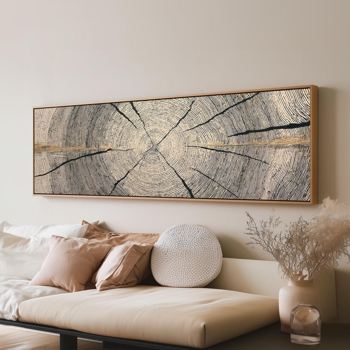 Pale gold wood ring long horizontal canvas print above a sofa in a living room