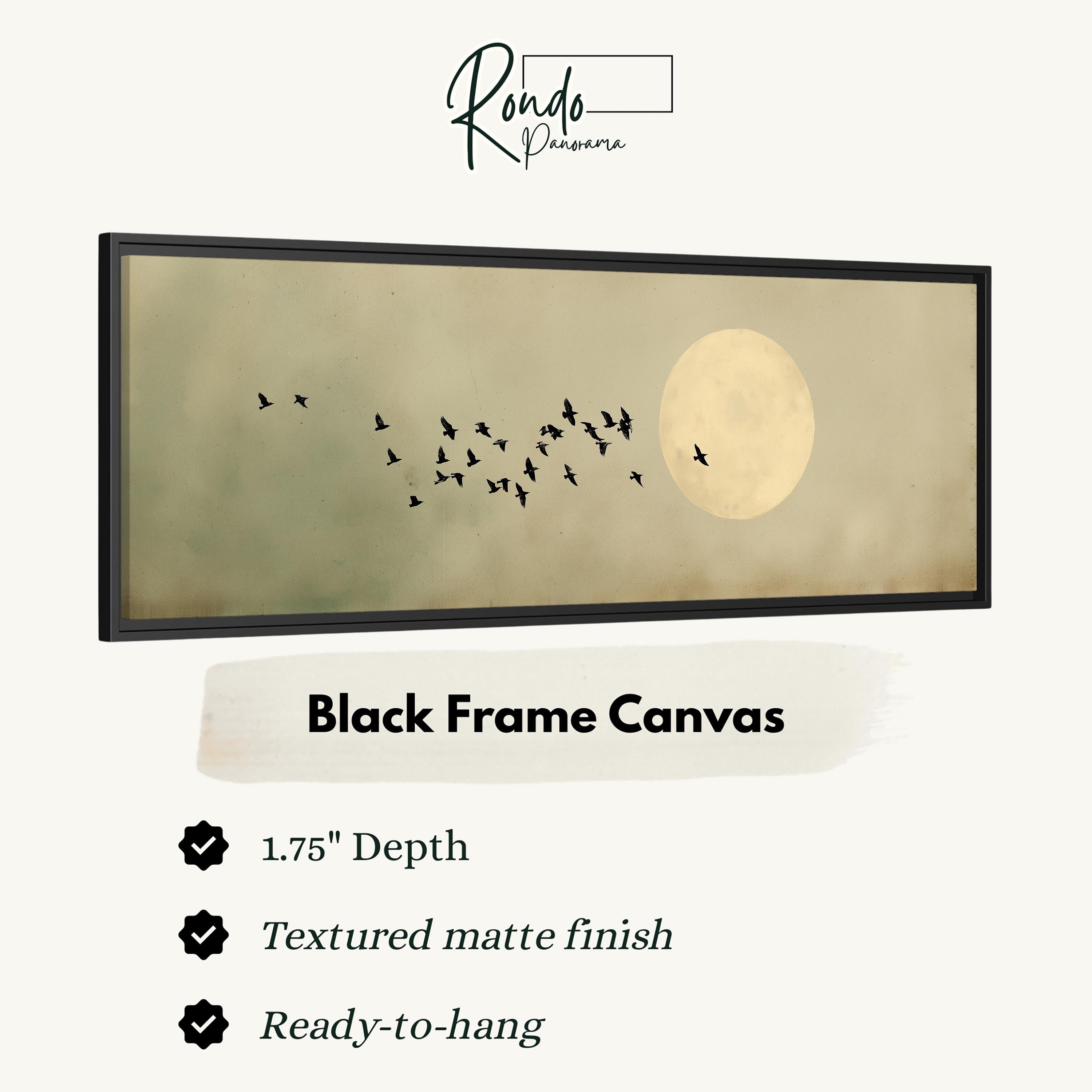 a black frame canvas with a flock of birds flying across a moonlit sky.