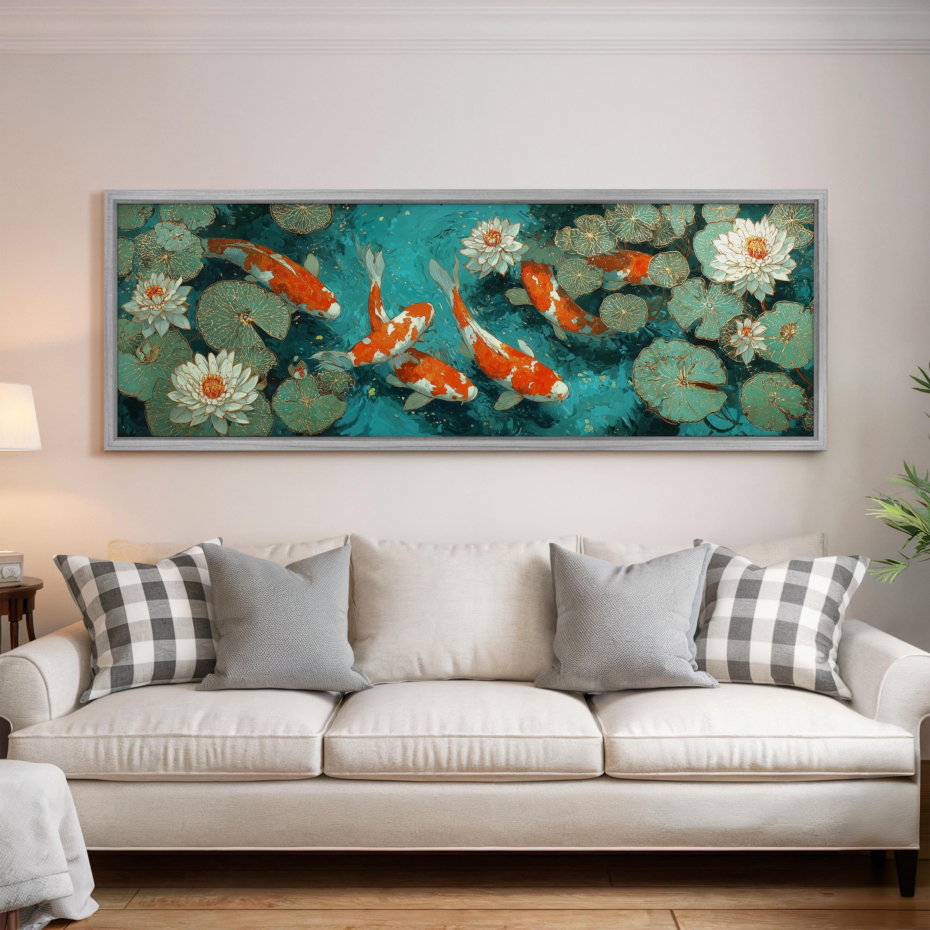 a large painting of koi fish swimming in a pond, with lily pads and flowers surrounding them, hanging on a wall above a white couch in a living room.