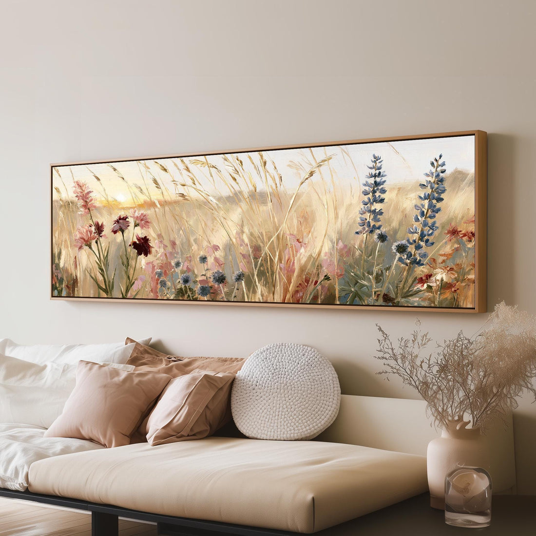 Golden wild grasses and lupins long horizontal canvas print above a sofa in a living room