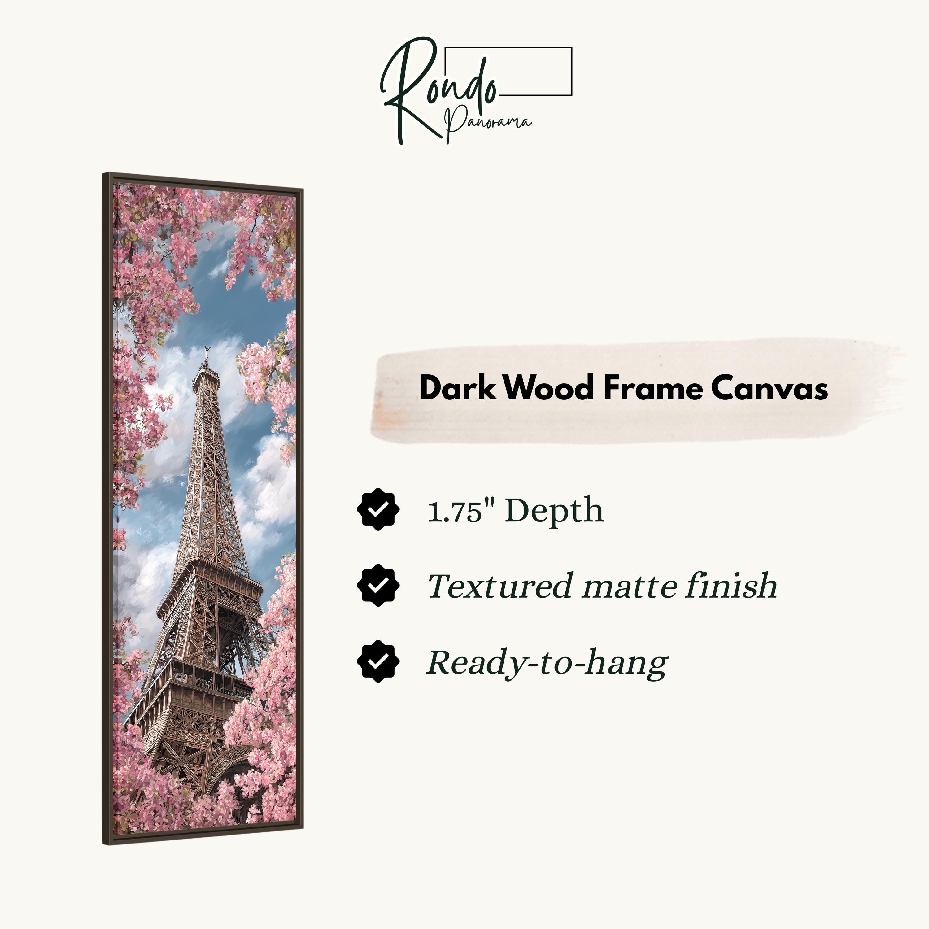 a tall tower with pink flowers in the background, and it is described as a dark wood frame canvas.