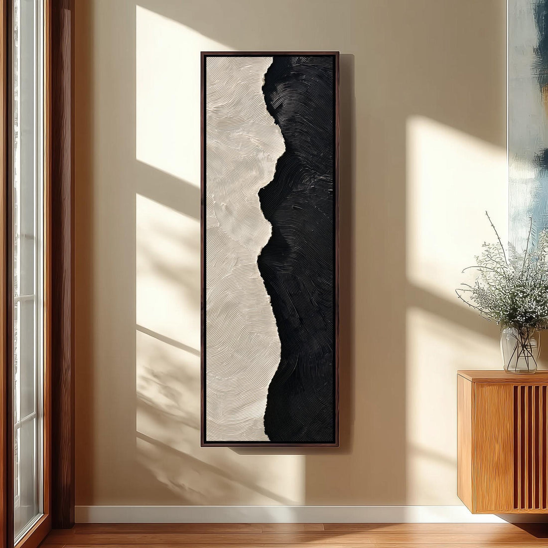 Black and cream textured brushstroke long vertical canvas print in a sunlit living space