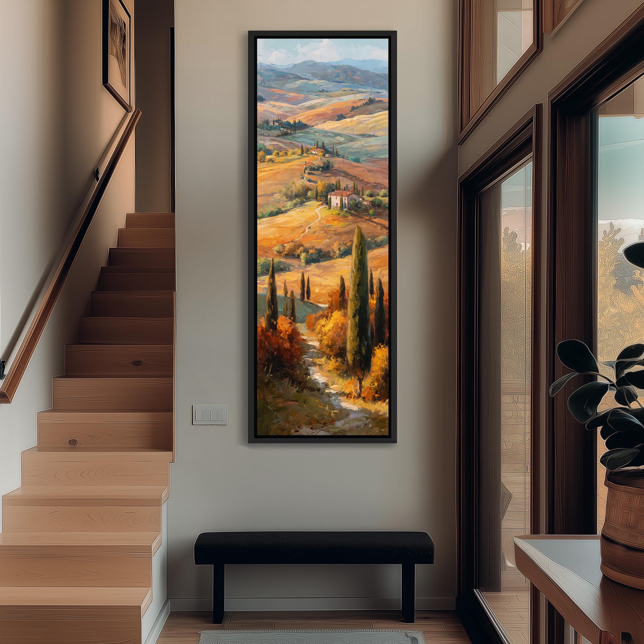 a large painting of a countryside landscape hanging on the wall of a hallway.