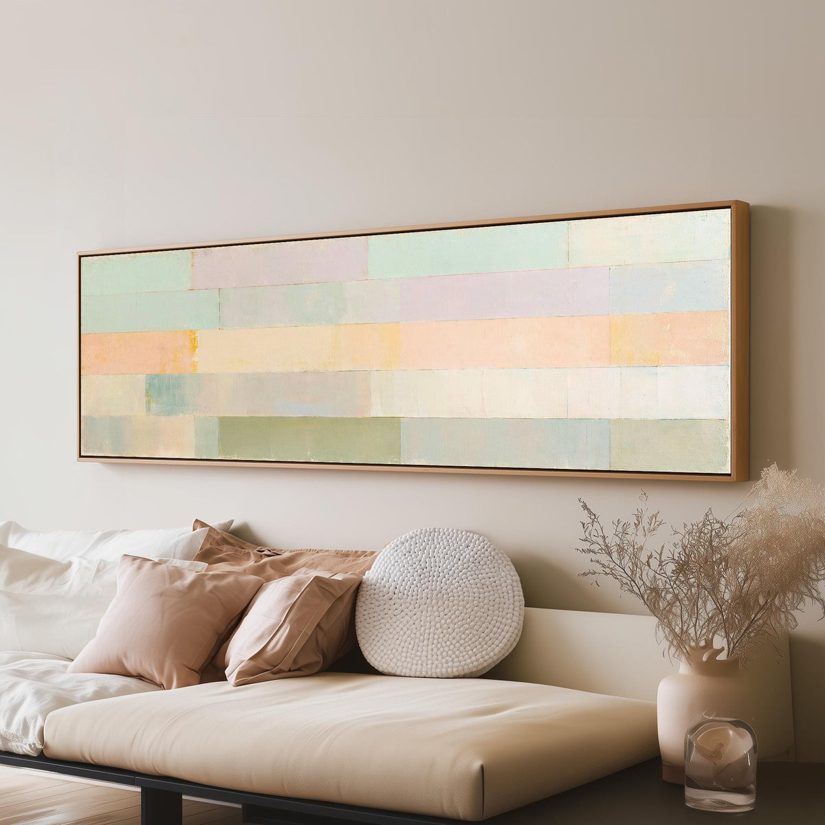 Soft lilac, mint and butter color bands long horizontal canvas print above a sofa in a living room