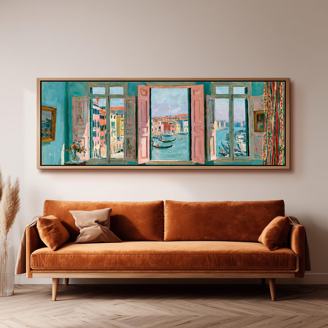 Venice canal and gondolas through a window long horizontal canvas print above a sofa in a living room