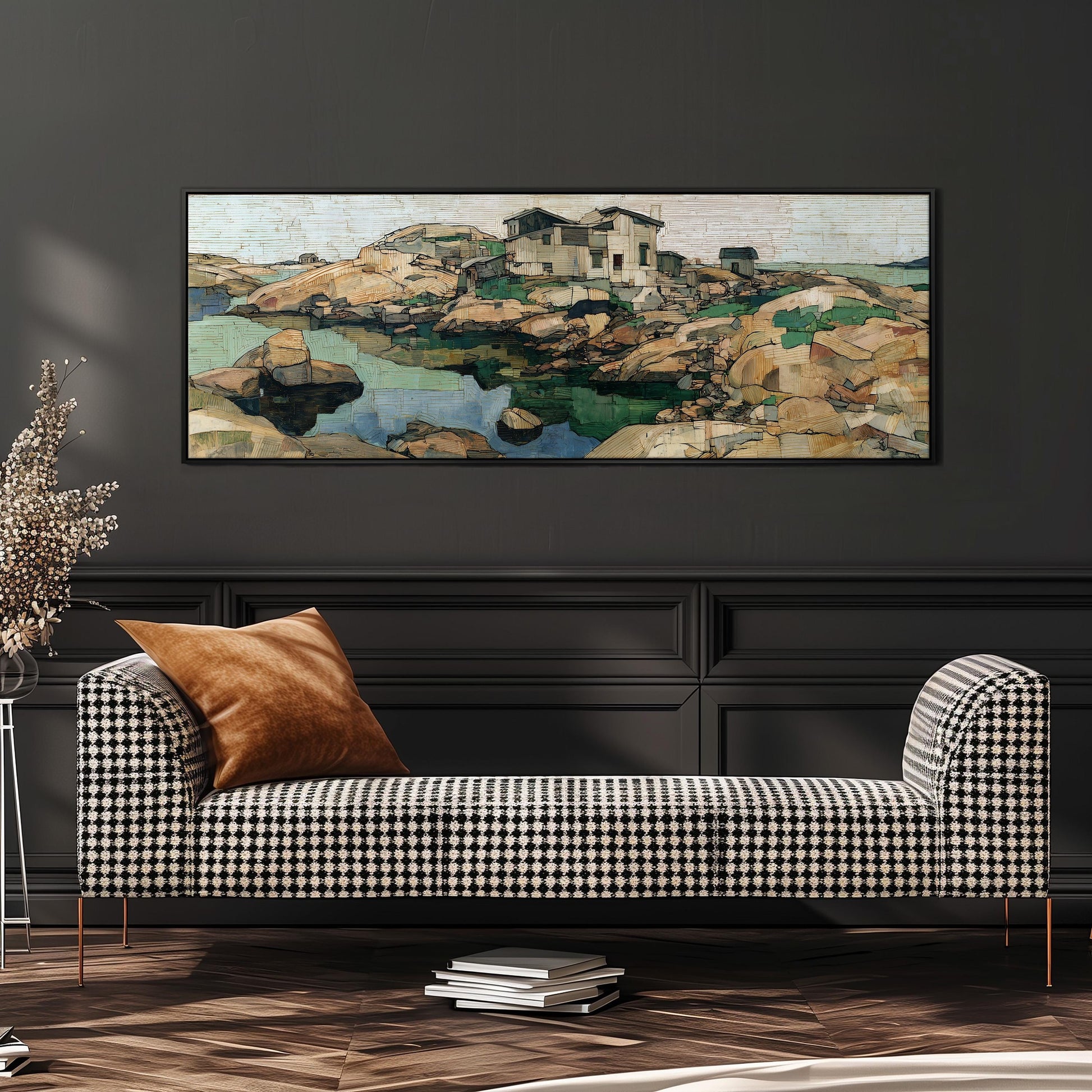 a black and white checkered sofa with a brown throw pillow, positioned in front of a large framed painting depicting a rocky landscape with a small building.