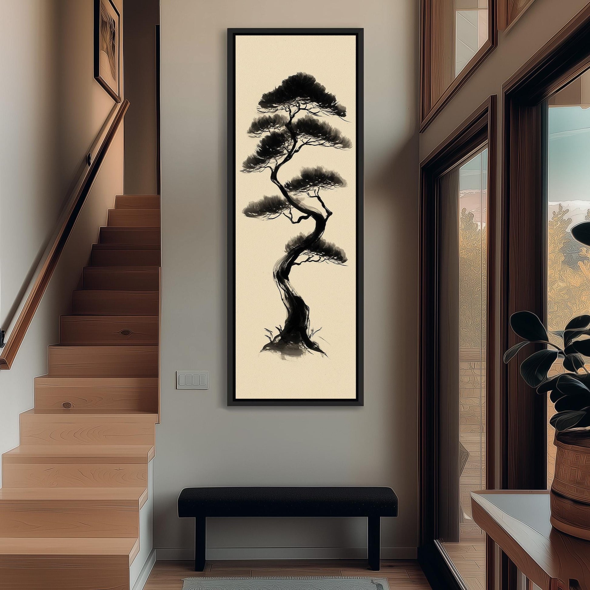 a large black and white tree painting hanging on the wall of a hallway. The painting is framed and appears to be the focal point of the space.
