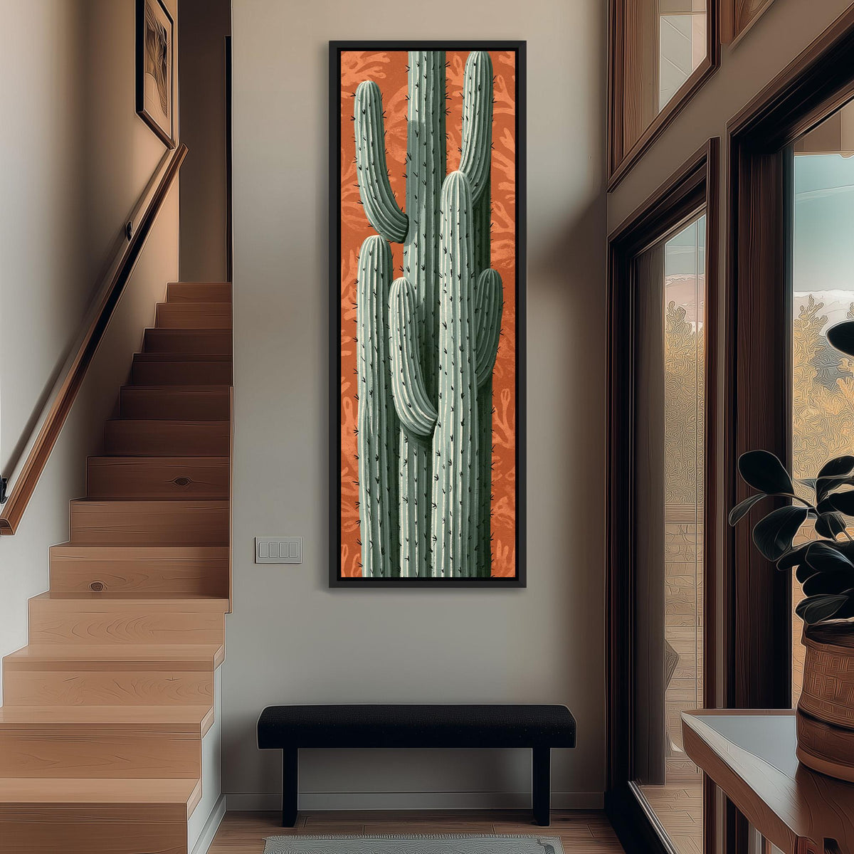 Saguaro cactus on a patterned terracotta background tall narrow canvas print beside a staircase in an entryway