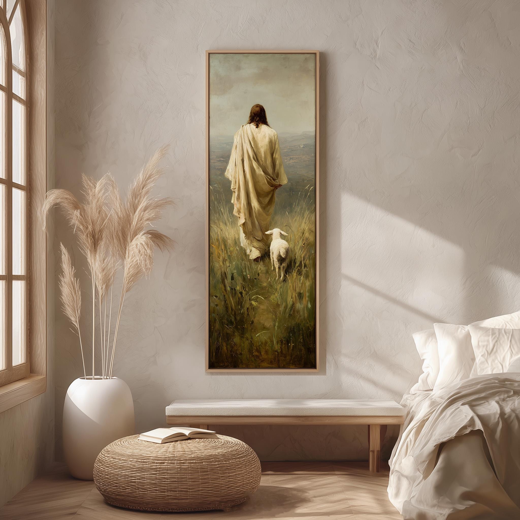a serene indoor setting with a large painting of a person in a flowing robe standing in a field, accompanied by a sheep. The painting is hung on a wall, and the room features a bed, a potted plant, and a woven ottoman.