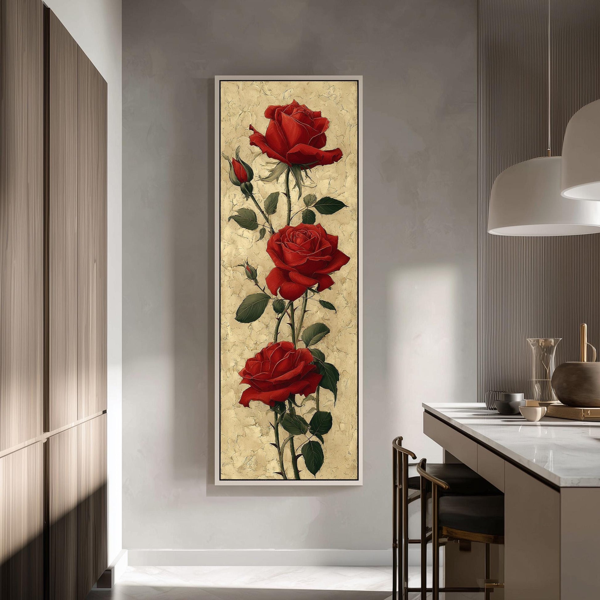 a large framed painting of three red roses hanging on a wall in a modern kitchen.