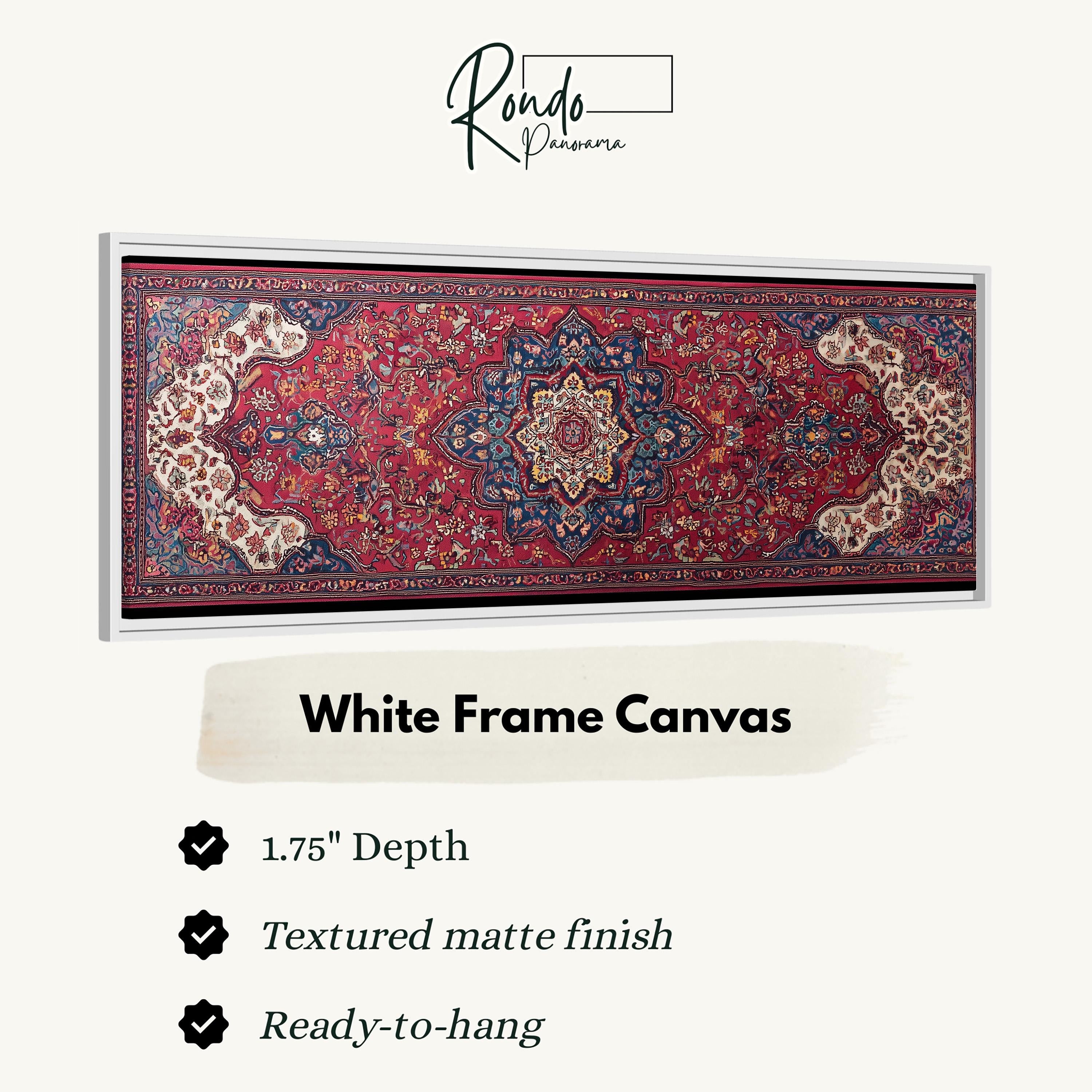 a large, intricately designed rug with a white frame. The rug has a 1.75" depth and is textured with a matte finish. It is ready to hang.