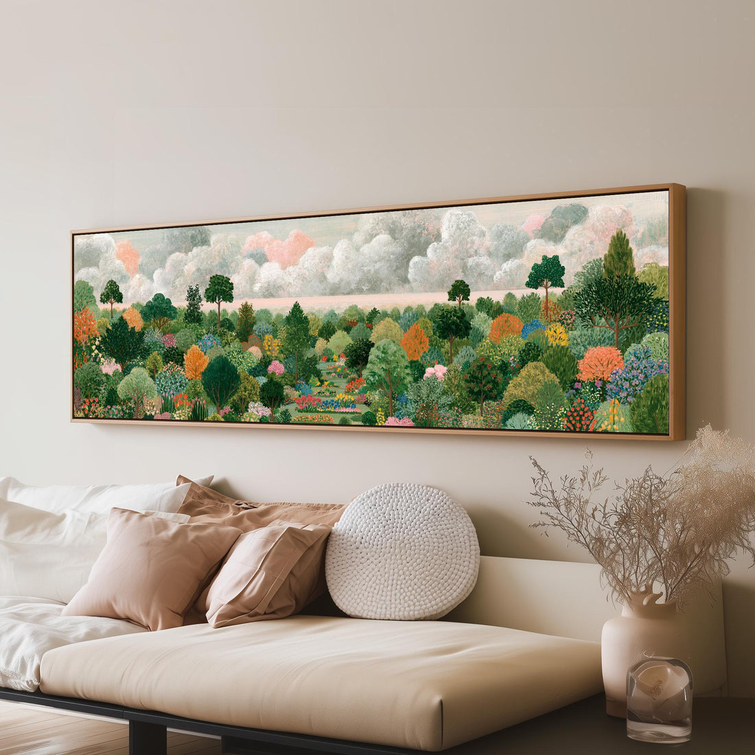 Folk art valley of patterned treetops long horizontal canvas print above a sofa in a living room