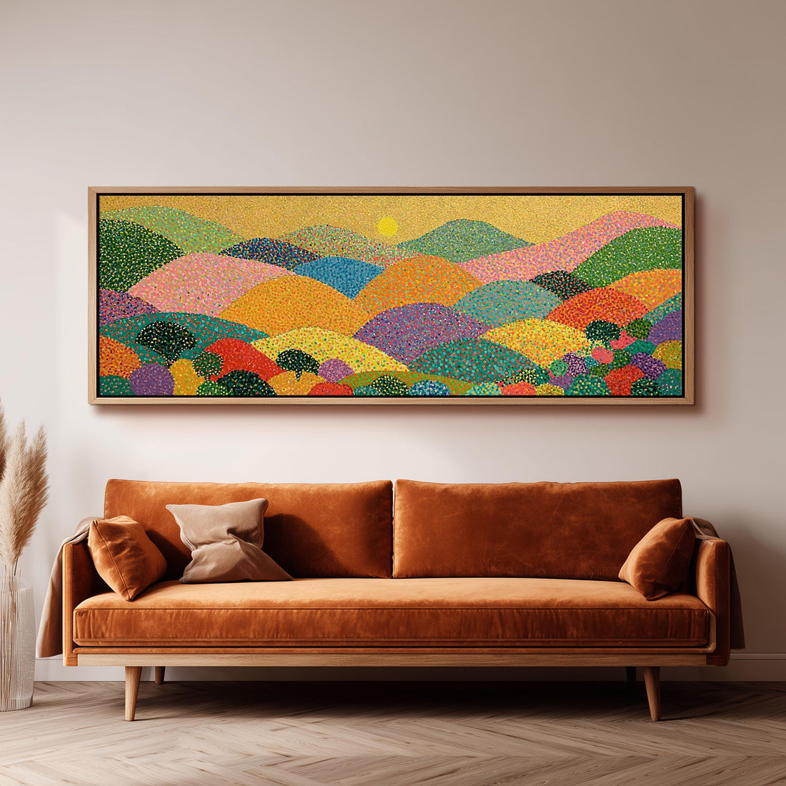 Dotted rainbow hills at sunset long horizontal canvas print above a sofa in a living room