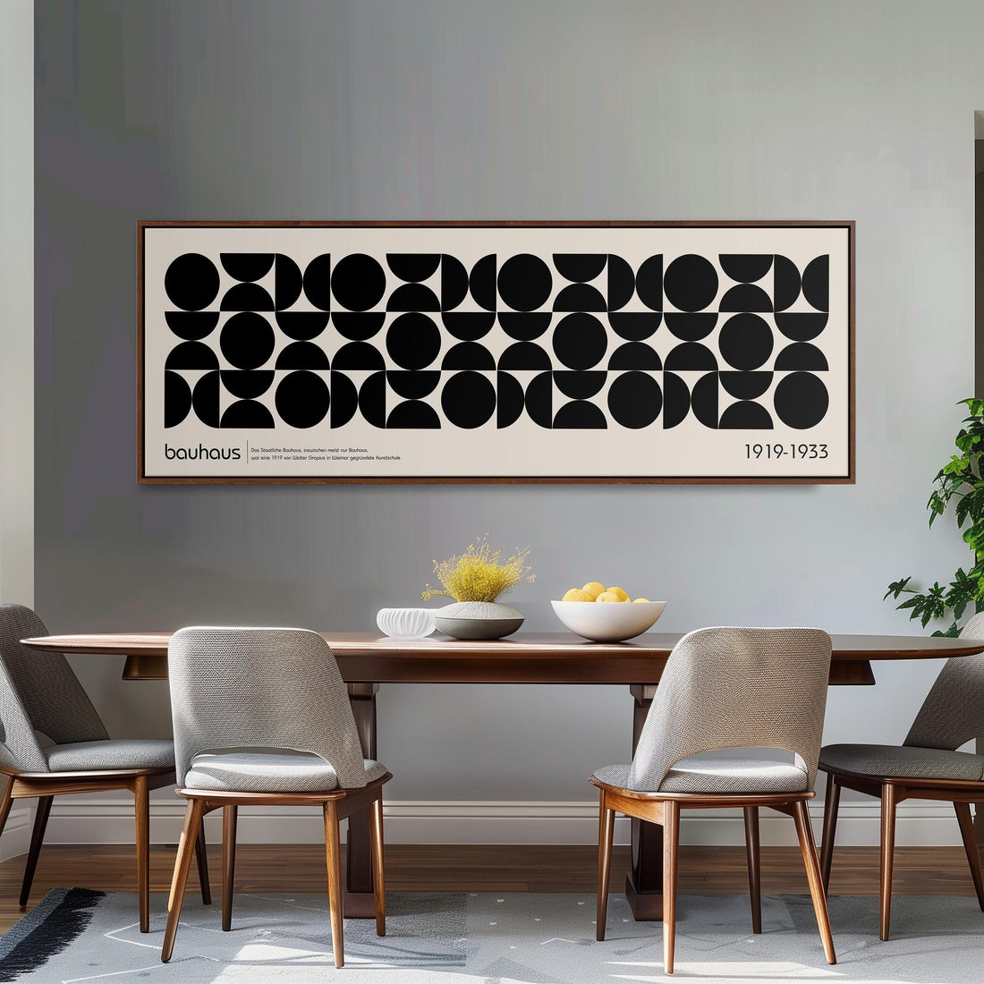 a modern black and white checkered sofa with a brown throw pillow, set against a dark wall with a framed abstract art piece above it.