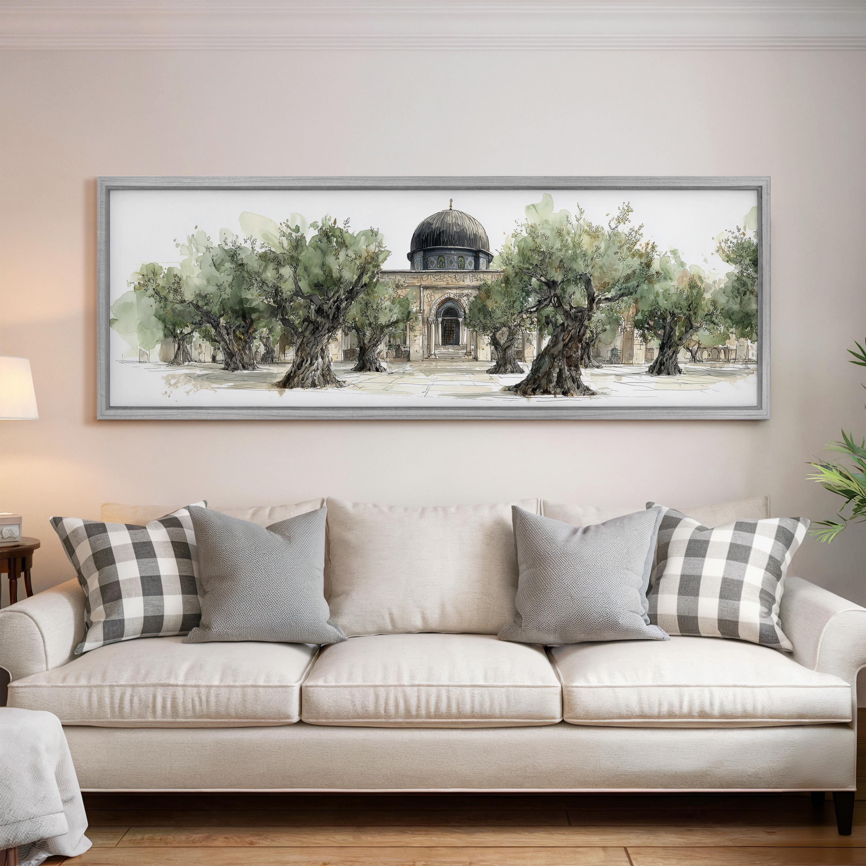 a large painting of a building with a dome, surrounded by trees, hanging on a wall above a white sofa with gray and white plaid throw pillows.