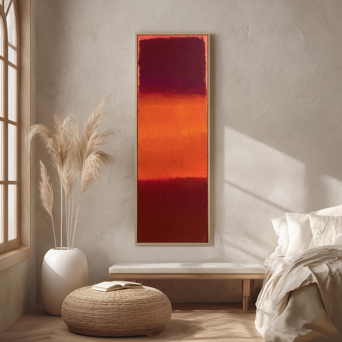 Color field bands in maroon, orange and red long vertical canvas print in a bright reading corner