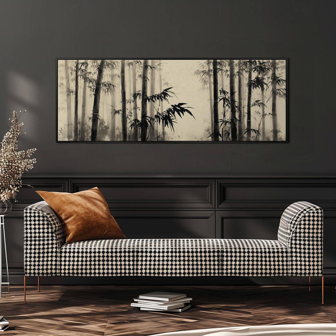 a black and white checkered sofa with a brown throw pillow, set against a dark wall with a framed black and white image of bamboo trees above it.