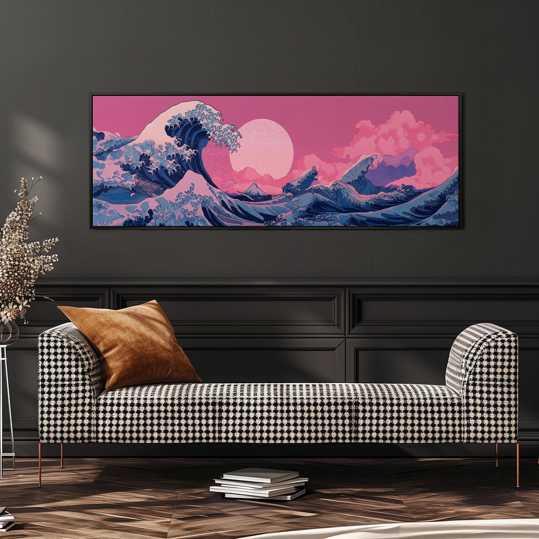 a large, colorful painting of a wave on a wall, with a pink and blue sky in the background. The painting is framed and hangs above a black and white checkered sofa with a brown throw pillow.