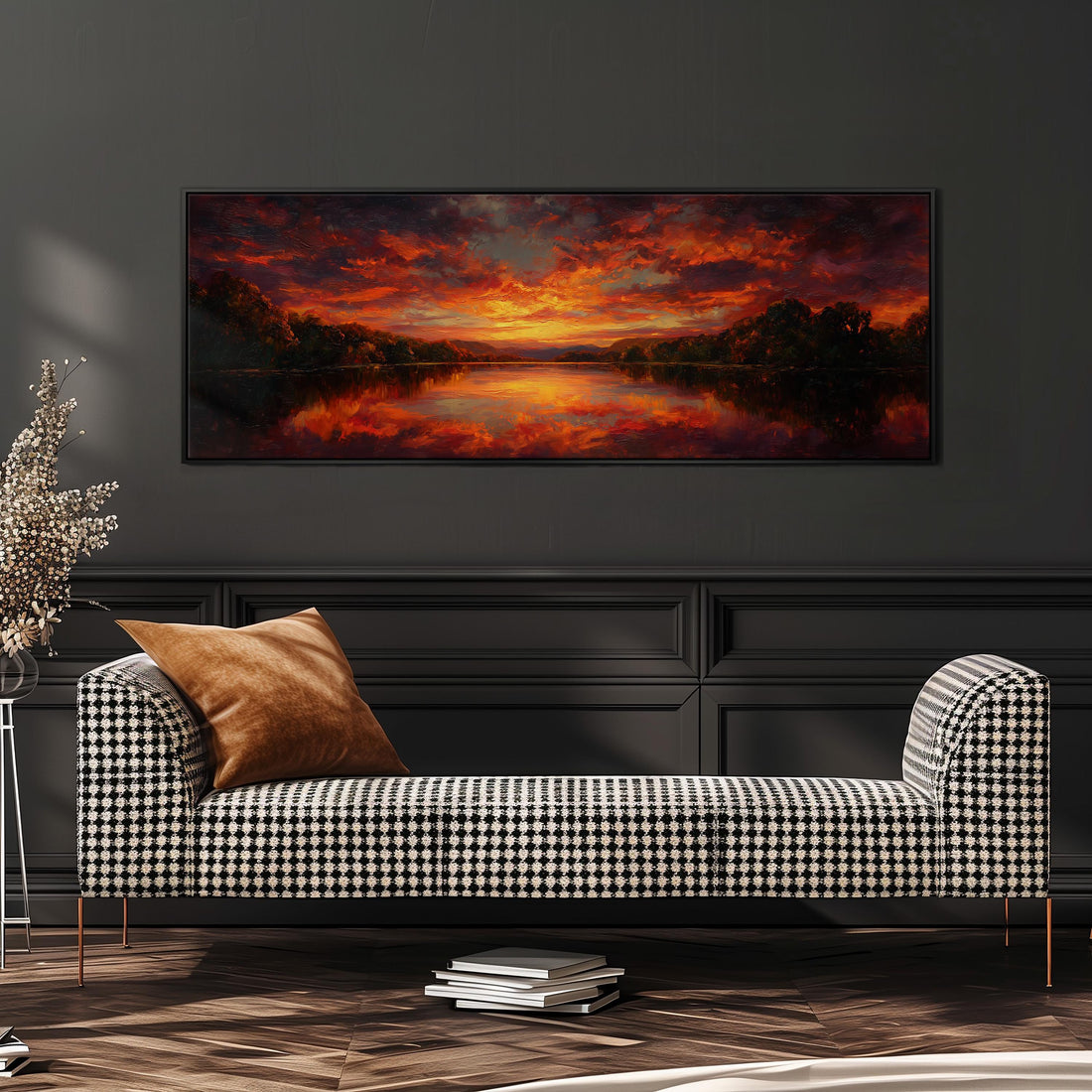 a large, framed painting of a sunset landscape hanging on a wall above a brown sofa.