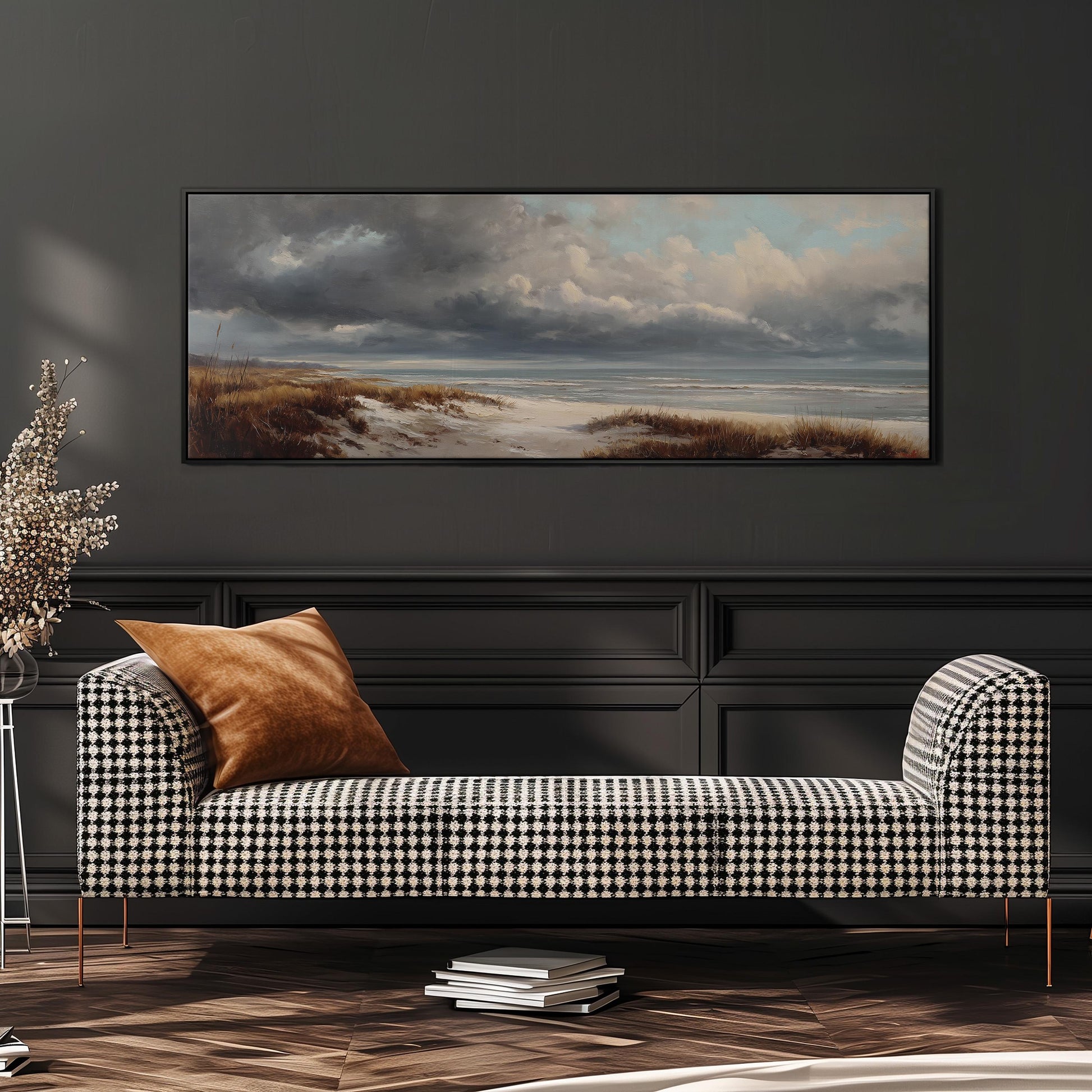 a black and white checkered sofa with a brown throw pillow, set against a dark wall with a large landscape painting hanging above it.