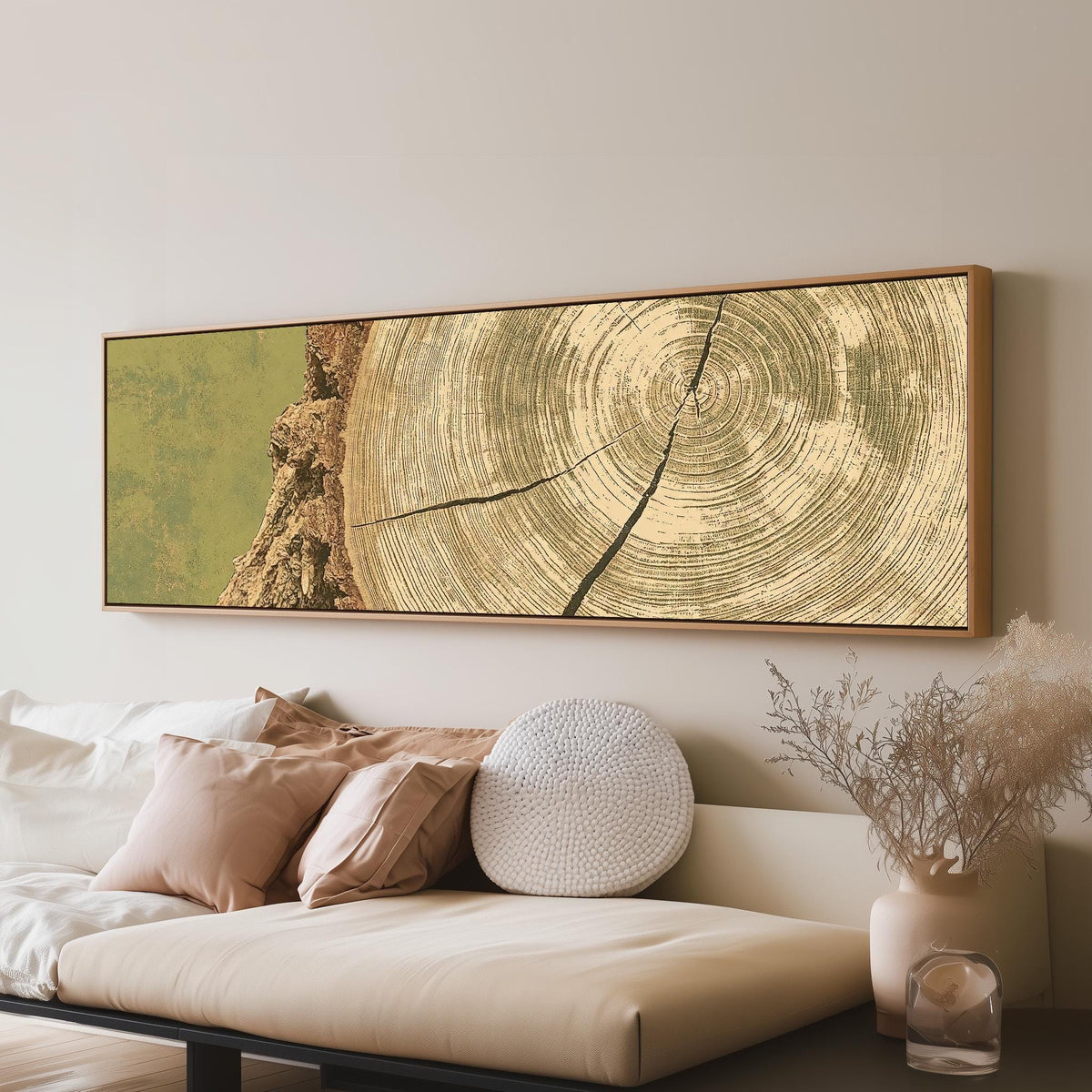 Golden tree ring wood grain long horizontal canvas print above a sofa in a living room