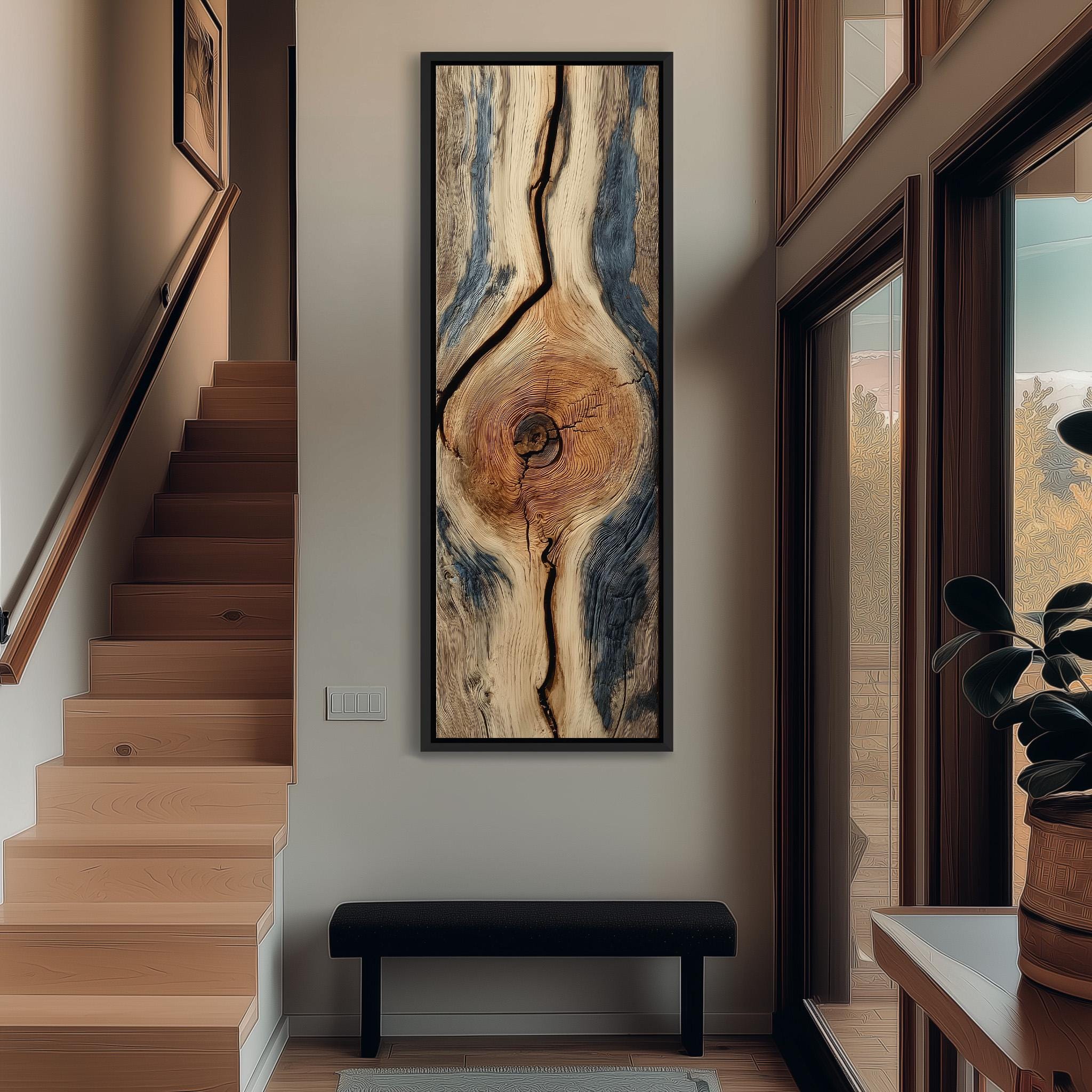 a modern interior design with a large abstract painting hanging on the wall, a wooden staircase, a black bench, and a potted plant.