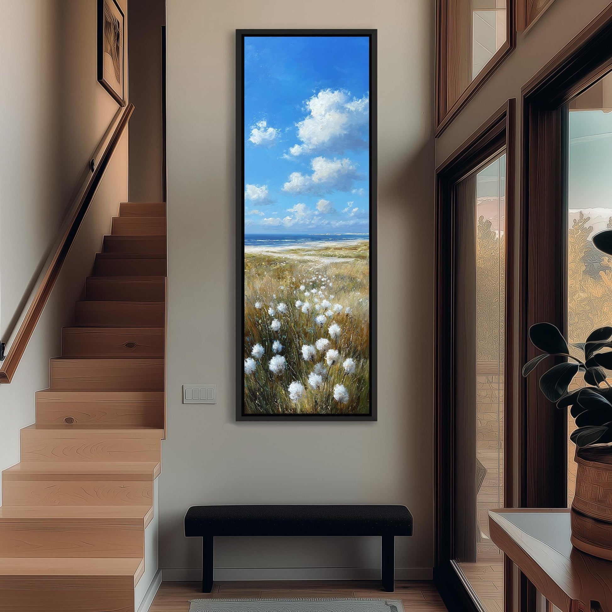 a large painting of a field with white flowers hanging on the wall of a hallway.