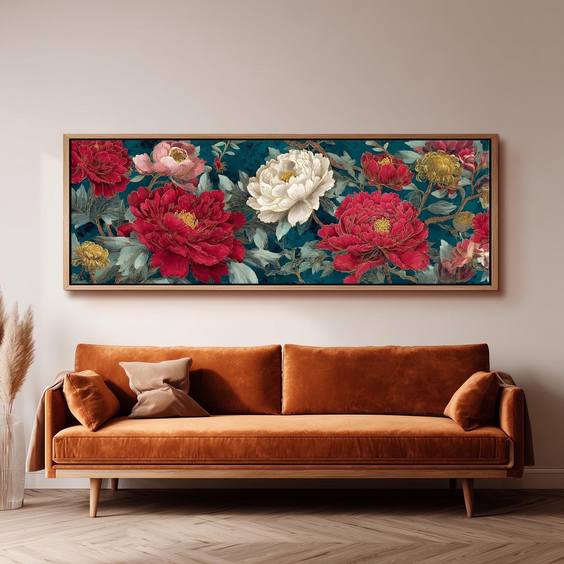 a large, framed painting of a floral arrangement hanging on a wall above a brown sofa.