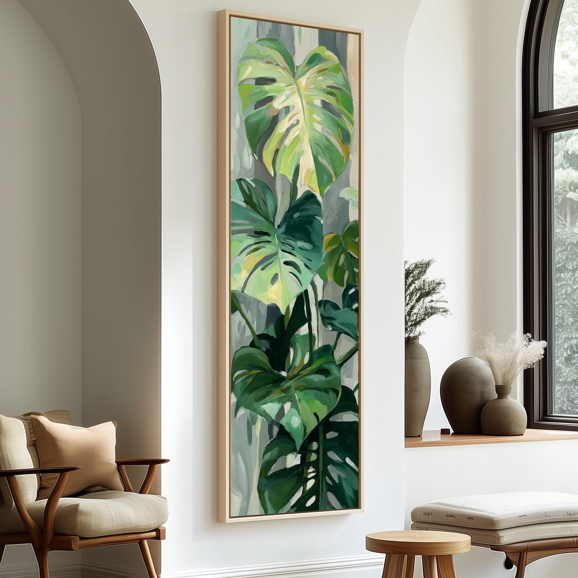 a large painting of tropical plants hanging on a wall in a room with a wooden chair and a small table.