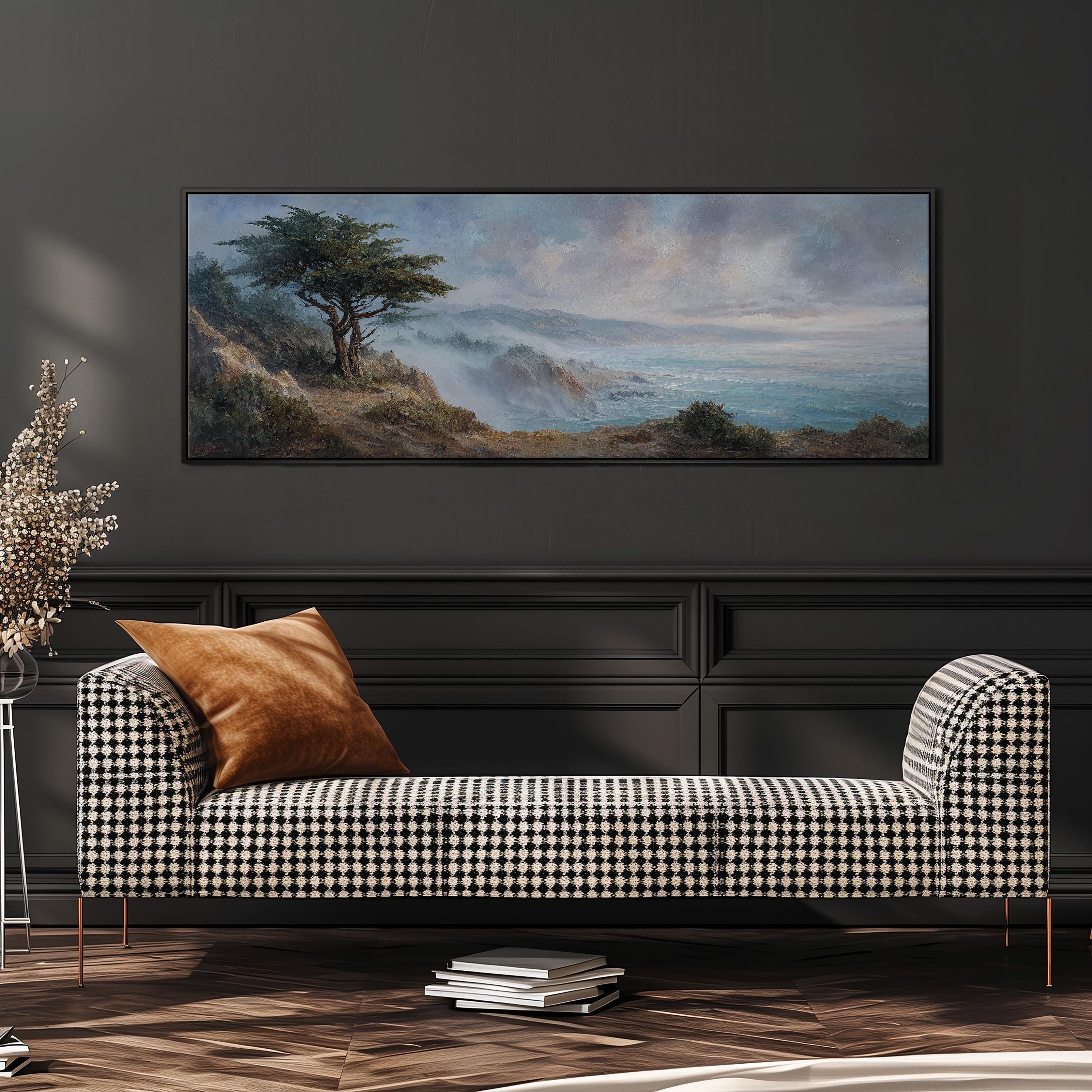 a large landscape painting hanging on a wall above a black and white checkered sofa with a brown throw pillow.