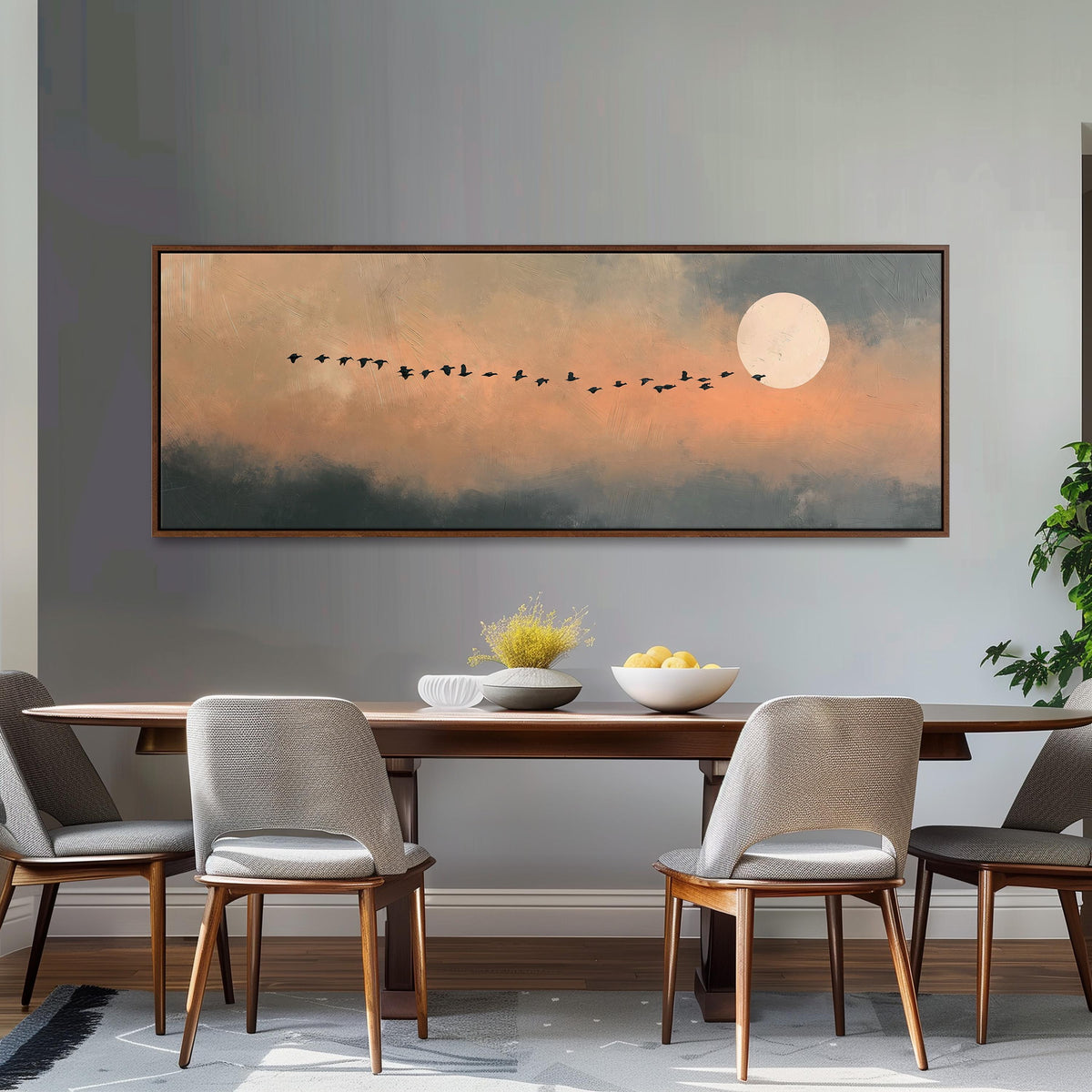 Geese flying toward the moon at twilight long horizontal canvas print above a dining table