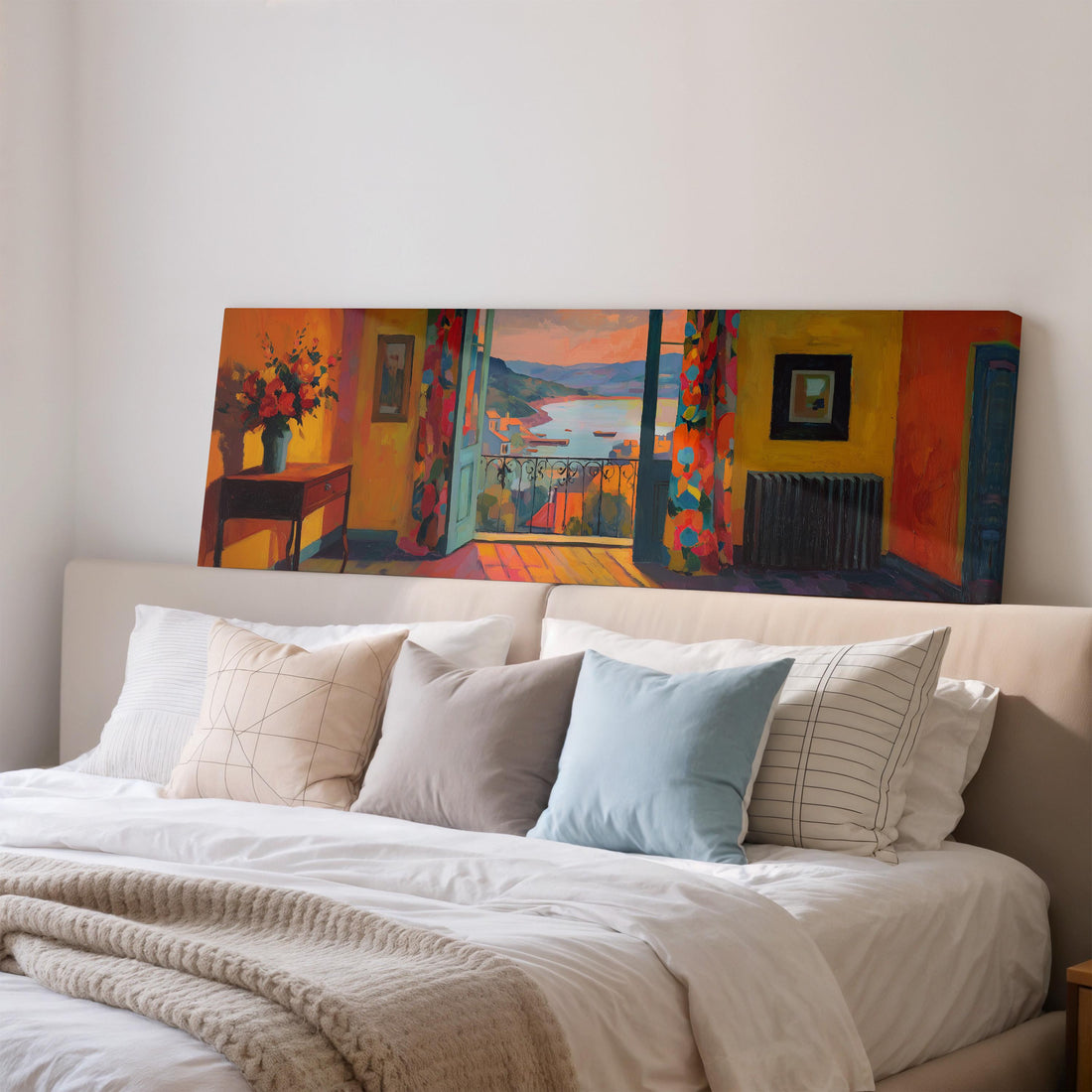 a large, colorful painting of a room with a couch and a vase of flowers, hanging on a wall above a brown sofa.