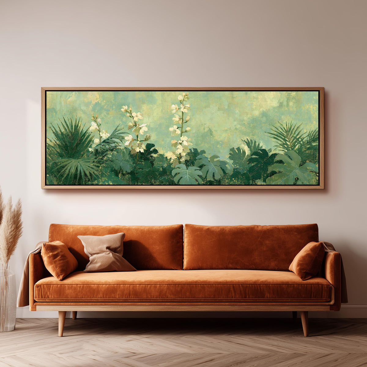 Tropical white blooms in green foliage panoramic canvas print above a sofa in a living room