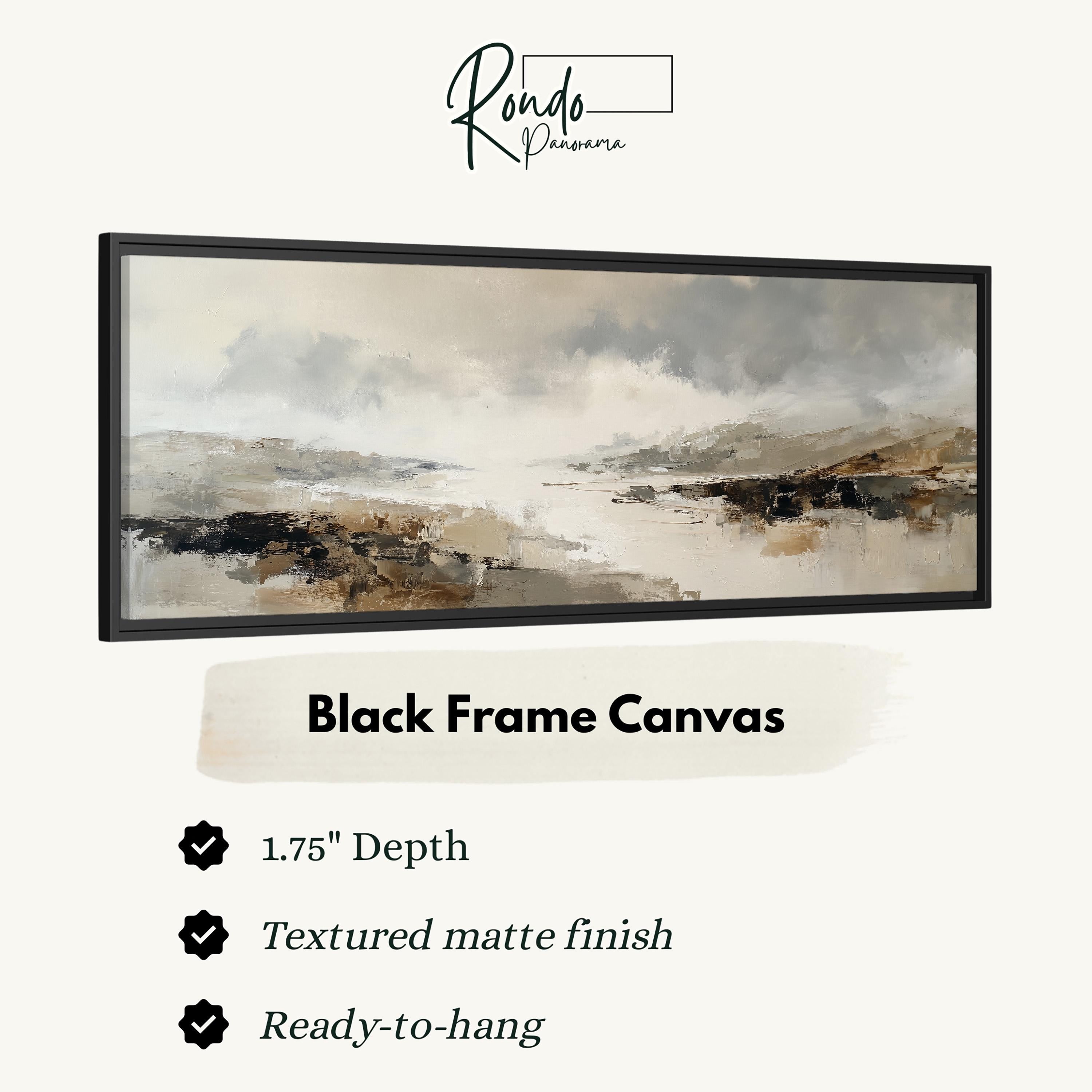 The image is a black frame canvas depicting a landscape with a cloudy sky and a body of water.