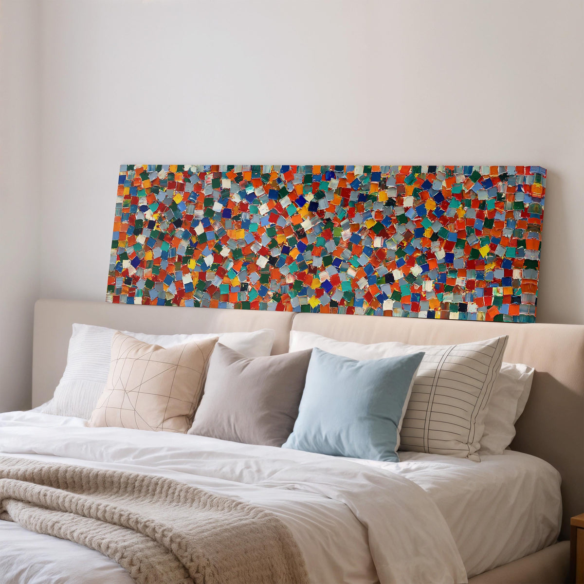 Colorful confetti mosaic squares wide panoramic canvas print above a bed in a bedroom