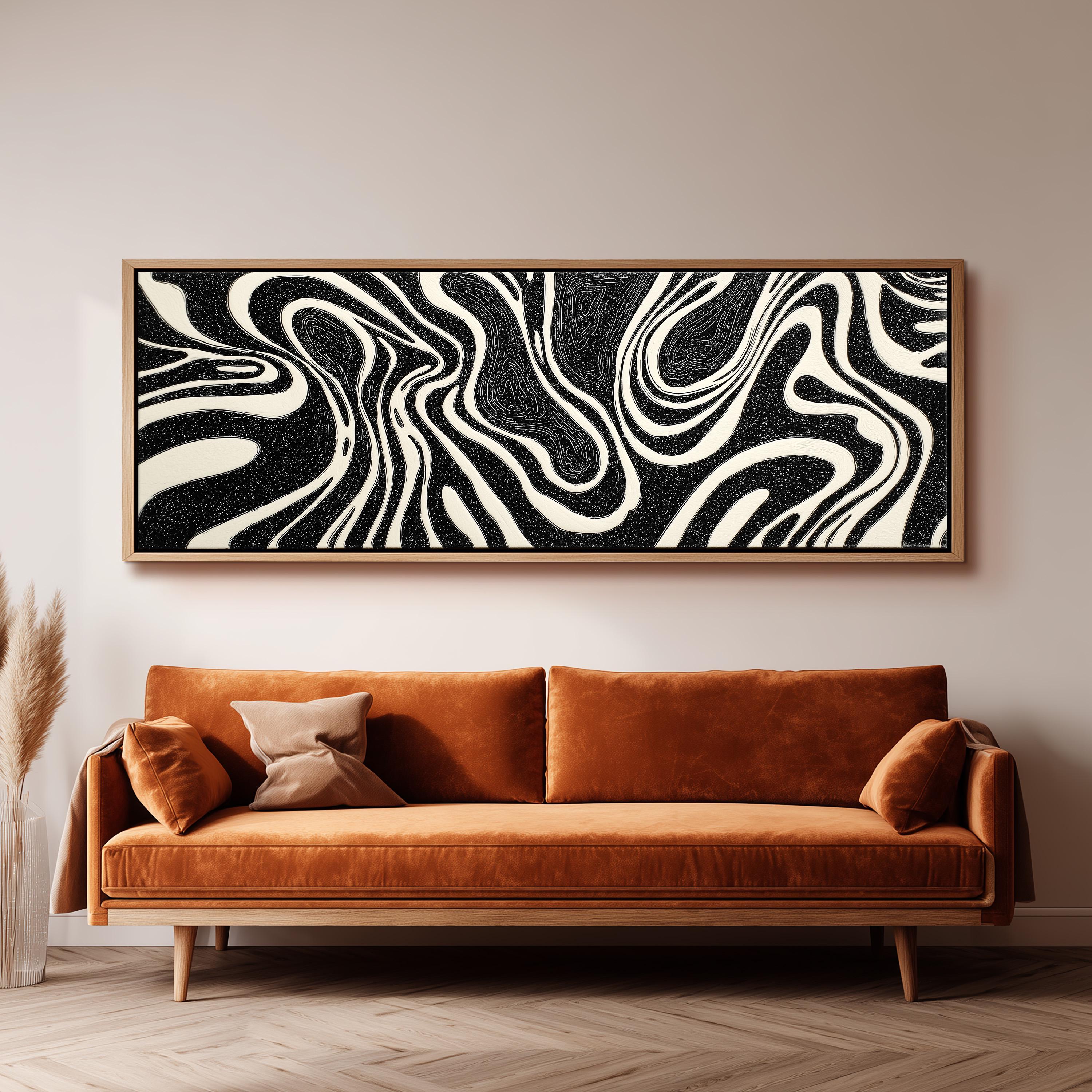 a large, abstract painting hanging on a wall above a brown sofa with orange cushions.