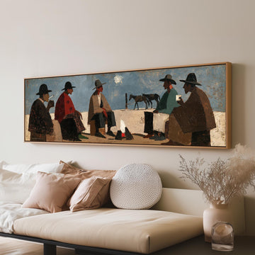 Cowboys gathered around a campfire long horizontal canvas print above a sofa in a living room