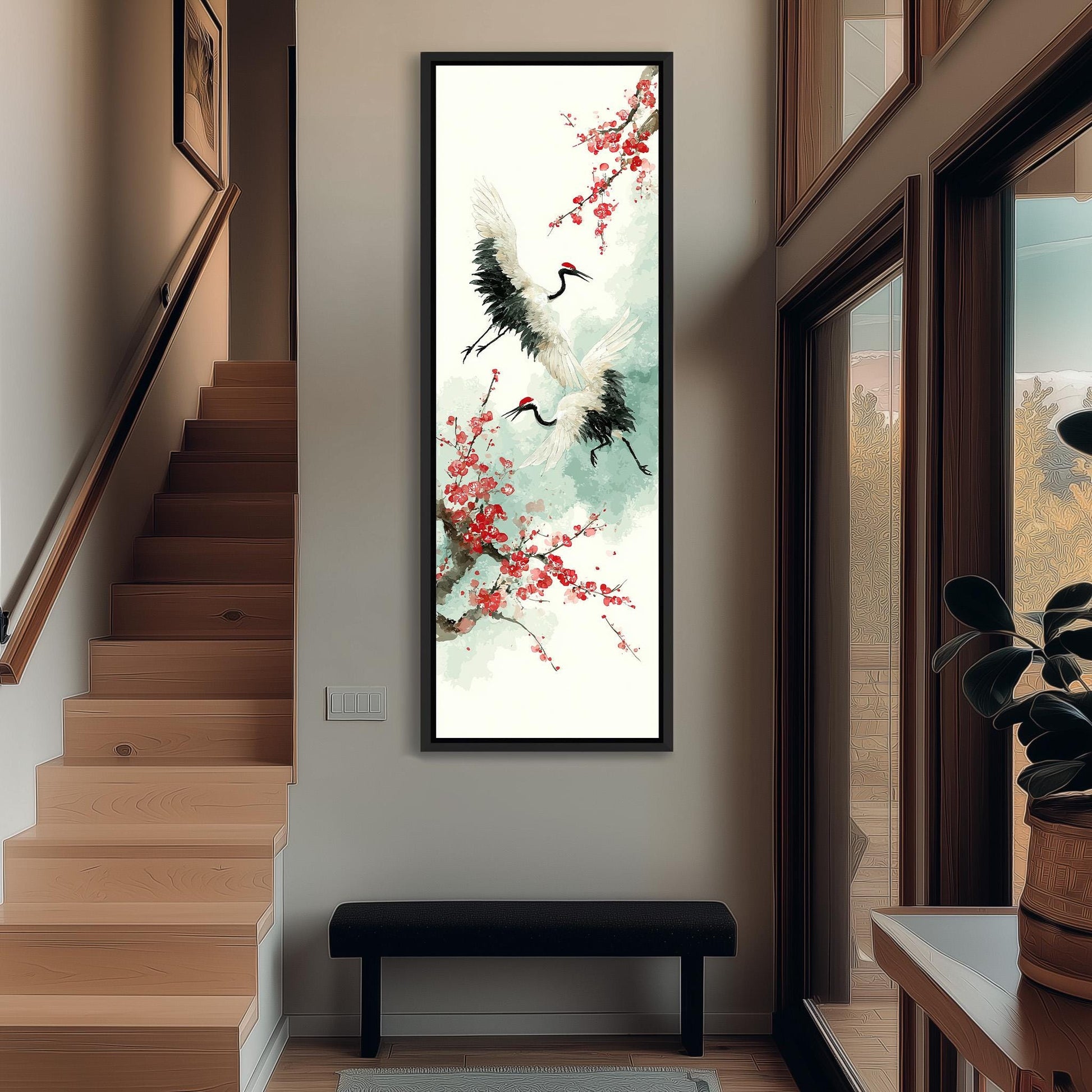 a large, colorful painting of two cranes in flight, hanging on a wall in a hallway. The painting is framed and appears to be the focal point of the space.